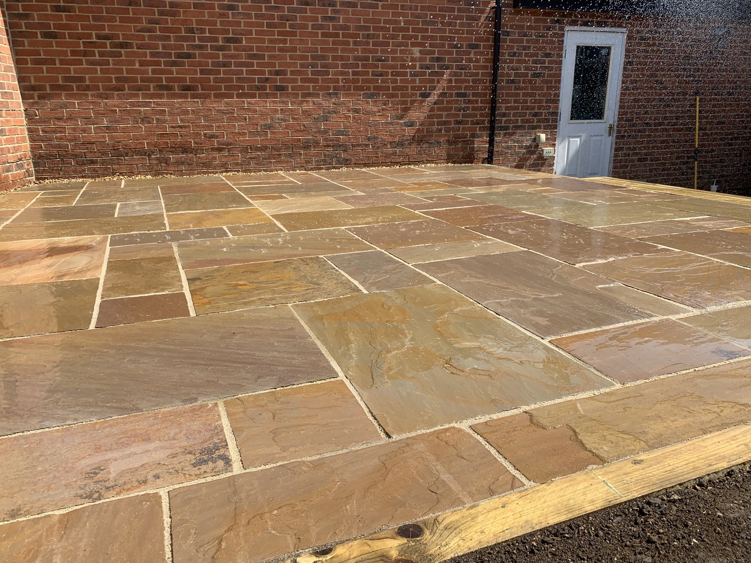 Sandstone Patios project by Stonecrest Paving and Landscaping